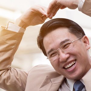 Employee showing his happiness in his career